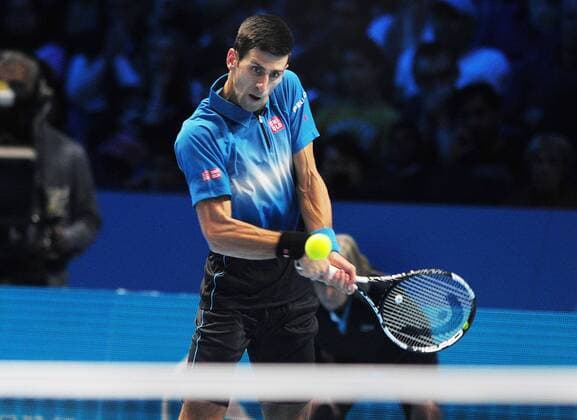 Tennis - 2015 ATP Tennis Herren World Tour Finals at The O2 - Day One Group : Stan Smith : Mens singles : Novak Djokovic (Serb) vs. Kai Nishikori (Jap) COLORSPORT ANDREW COWIE 
