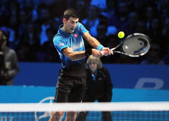 Tennis - 2015 ATP Tennis Herren World Tour Finals at The O2 - Day One Group : Stan Smith : Mens singles : Novak Djokovic (Serb) vs. Kai Nishikori (Jap) COLORSPORT ANDREW COWIE 