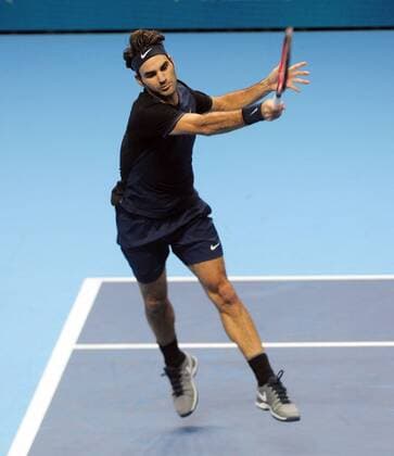 Tennis - 2015 ATP Tennis Herren World Tour Finals at The O2 - Day One Group : Stan Smith : Mens singles : Roger Federer (Sui) vs. Tomas Berdych (Cze) Roger Federer COLORSPORT ANDREW COWIE 
