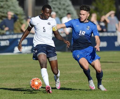 Nov. 15, 2015 - Washington, DC, USA - 20151115 - Georgetown defender JOSHUA YARO (5) takes the ball away from Creighton midfielder TIMO PITTER (18) in the second half of the Big East Tournament Final at Shaw Field in Washington. Soccer 2015 - Georgetown beats Creighton 2-1 in Big East Tournament Final - ZUMAm139