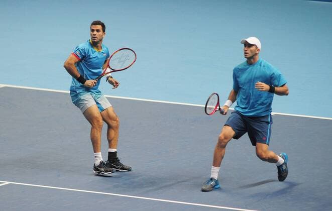 Tennis - 2015 ATP Tennis Herren World Tour Finals at The O2 - Day One Group Fleming McEnroe Doubles: Jean-Julien Rojer (France) & Horia Tecau (Romania) vs. Marcin Matkowski (Poland) & Nenad Zimonjic (Serbia) Jean-Julien Rojer (France) & Horia Tecau (Romania) COLORSPORT ANDREW COWIE 