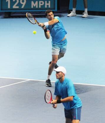 Tennis - 2015 ATP Tennis Herren World Tour Finals at The O2 - Day One Group Fleming McEnroe Doubles: Jean-Julien Rojer (France) & Horia Tecau (Romania) vs. Marcin Matkowski (Poland) & Nenad Zimonjic (Serbia) Jean-Julien Rojer (France) & Horia Tecau (Romania) COLORSPORT ANDREW COWIE 