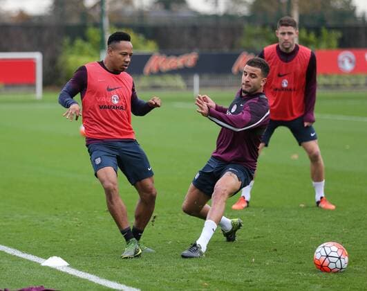 England s Nathaniel Clyne tussles with Kyle Walker during training England Training - Tottenham Hotspur Training Ground - England - 16th November 2015 - Picture David Klein Sportimage EDITORIAL USE ONLY. No use with unauthorised audio, video, data, fixture lists, club league logos or live services. Online in-match use limited to 120 images, no video emulation. No use in betting, games or single club league player publications.