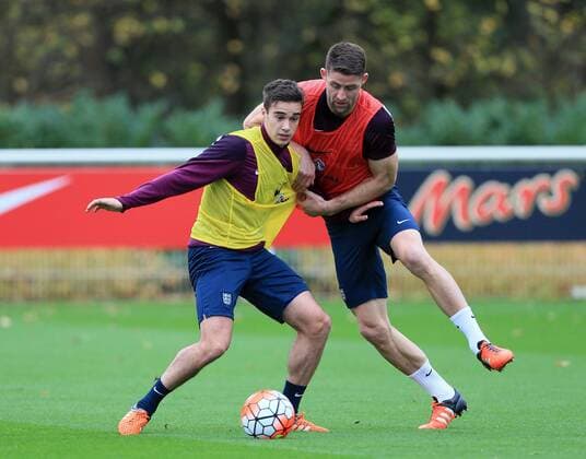 Tottenham s Harry Winks tussles with Gary Cahill during training England Training - Tottenham Hotspur Training Ground - England - 16th November 2015 - Picture David Klein Sportimage EDITORIAL USE ONLY. No use with unauthorised audio, video, data, fixture lists, club league logos or live services. Online in-match use limited to 120 images, no video emulation. No use in betting, games or single club league player publications.