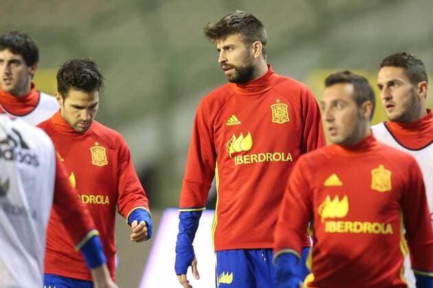- BRUSSELS, BELGIUM: Spain s Cesc Fabregas and Spain s Gerard Pique pictured during a training session of the Spanish national soccer team, Monday 16 November 2015, in Brussels. Tomorrow Spain is playing the Red Devils, the Belgian national soccer team, in preparation of the Euro2016 European Championships. BRUNOxFAHY  x04741445x