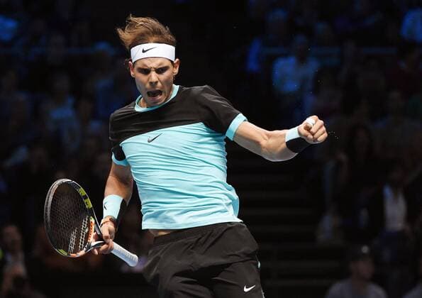 Nadal begins World Tour Finals campaign with win Rafael Nadal pumps his fist after winning a point during his group stage match against Stan Wawrinka at the ATP Tennis Herren World Tour Finals in London on Nov. 16, 2015. Nadal won 6-3, 6-2. 