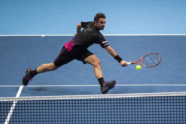 18.11.2015. The O2, London, England. ATP Tennis Herren Tennis Tour Finals. Day 4. Stan Wawrinka (SUI) 4 in action in his match against David Ferrer (ESP) 7 . xStephenxBartholomewx  ActionPlus11682780
