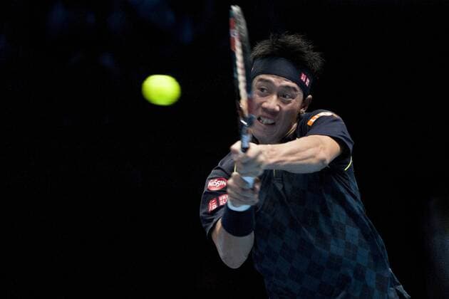 19.11.2015. The O2, London, England. ATP Tennis Herren Tennis Tour Finals. Day 5. Kei Nishikori (JPN) 8 in action in his match against Roger Federer (SUI) 3 . Federer won the match 7-5, 4-6, 6-4 xStephenxBartholomewx  ActionPlus11682891