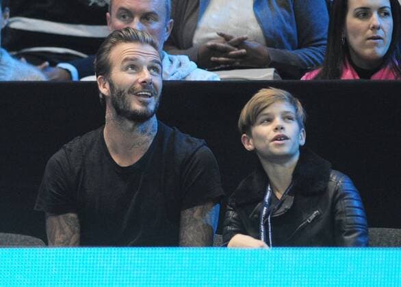 Tennis - 2015 ATP Tennis Herren World Tour Finals at The O2 - Day Six Semi Final Singles: Rafael Nadal (Spain) vs. Novak Djokovic (Serb) Footballer David Beckham watches the match with his son Romeo COLORSPORT ANDREW COWIE 