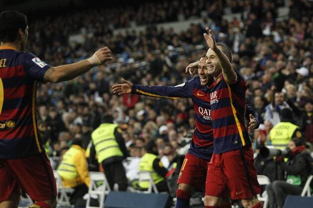 Barcelona s Iniesta celebrates a goal with Neymar Jr during 2015-16 La Liga match between Real Madrid and Barcelona at Santiago Bernabeu stadium in Madrid, Spain. November 21, 2015.  (20151121051)