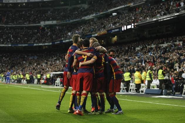 Barcelona s players celebrate Neymar Jr s goal during 2015-16 La Liga match between Real Madrid and Barcelona at Santiago Bernabeu stadium in Madrid, Spain. November 21, 2015.  (20151121053)