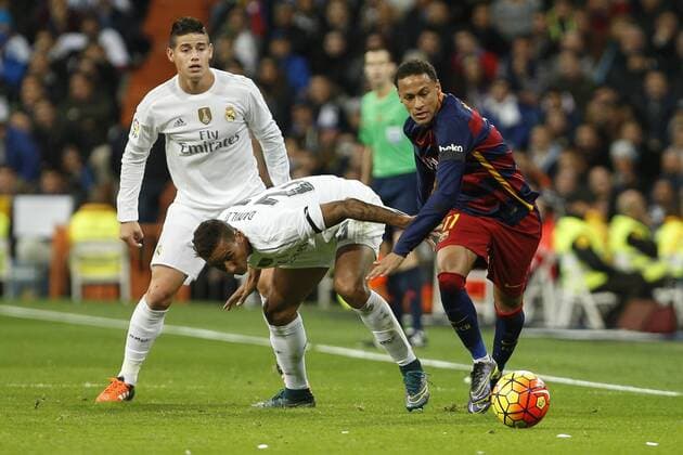 Real Madrid s Danilo and James Rodriguez and Barcelona s Neymar Jr during 2015-16 La Liga match between Real Madrid and Barcelona at Santiago Bernabeu stadium in Madrid, Spain. November 21, 2015.  (20151121039)