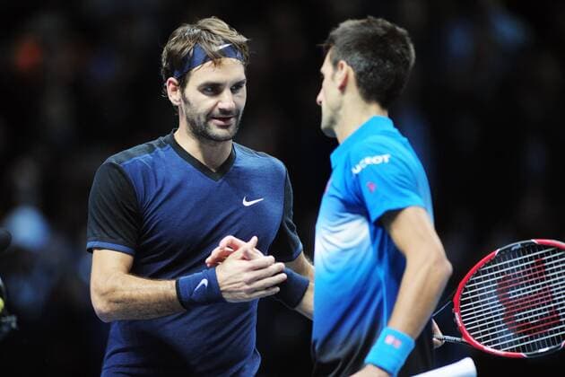 Tennis - 2015 ATP Tennis Herren World Tour Finals at The O2 - Day Seven Singles Final : Novak Djokovic (Srb) v Roger Federer (Sui) Novak Djokovic is congratulated by Roger Federer at the net after the match COLORSPORT ANDREW COWIE 