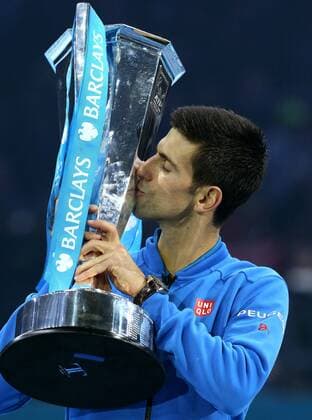 (151123) -- LONDON, Nov. 22, 2015 -- Novak Djokovic of Serbia celebrates with the trophy after winning the men s single s final against Roger Federer of Switzerland at the ATP Tennis Herren World Tour Finals at the O2 Arena in London, Britain, Nov. 22, 2015. Djokovic won 2-0. )? (SP)BRITAIN-LONDON-TENNIS-ATP FINAL-FEDERER VS DJOKOVIC HanxYan 