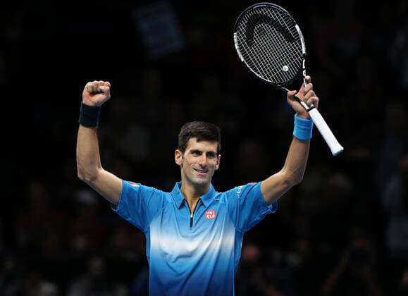 (151123) -- LONDON, Nov. 22, 2015 -- Novak Djokovic of Serbia celebrates after winning the men s single s final against Roger Federer of Switzerland at the ATP Tennis Herren World Tour Finals at the O2 Arena in London, Britain, Nov. 22, 2015. Djokovic won 2-0. )? (SP)BRITAIN-LONDON-TENNIS-ATP FINAL-FEDERER VS DJOKOVIC HanxYan 