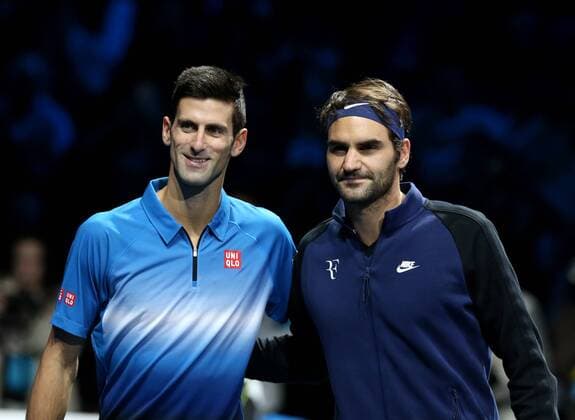 (151123) -- LONDON, Nov. 22, 2015 -- Novak Djokovic (L) of Serbia and Roger Federer of Switzerland pose ahead of the men s single s final at the ATP Tennis Herren World Tour Finals at the O2 Arena in London, Britain, Nov. 22, 2015. Djokovic won 2-0. )? (SP)BRITAIN-LONDON-TENNIS-ATP FINAL-FEDERER VS DJOKOVIC HanxYan 