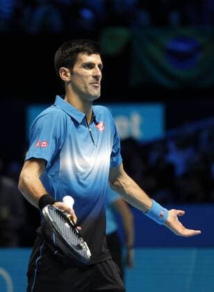 (151123) -- LONDON, Nov. 22, 2015 -- Novak Djokovic of Serbia reacts during the men s single s final against Roger Federer of Switzerland at the ATP Tennis Herren World Tour Finals at the O2 Arena in London, Britain, Nov. 22, 2015. Djokovic won 2-0. )? (SP)BRITAIN-LONDON-TENNIS-ATP FINAL-FEDERER VS DJOKOVIC HanxYan 
