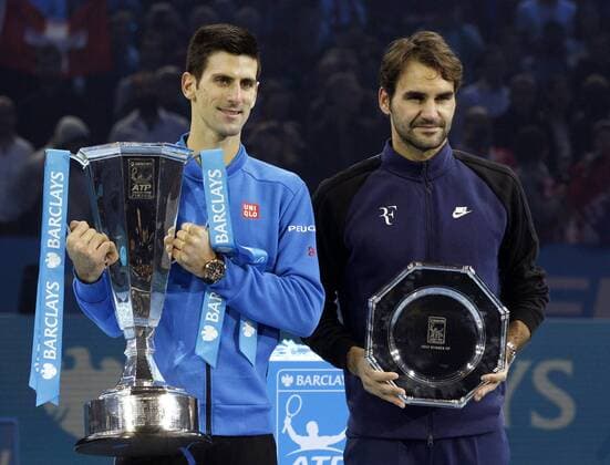 (151123) -- LONDON, Nov. 22, 2015 -- Novak Djokovic (L) of Serbia and Roger Federer of Switzerland pose during the awarding ceremony for the men s single s final against Roger Federer of Switzerland at the ATP Tennis Herren World Tour Finals at the O2 Arena in London, Britain, Nov. 22, 2015. Djokovic won 2-0. )? (SP)BRITAIN-LONDON-TENNIS-ATP FINAL-FEDERER VS DJOKOVIC HanxYan 