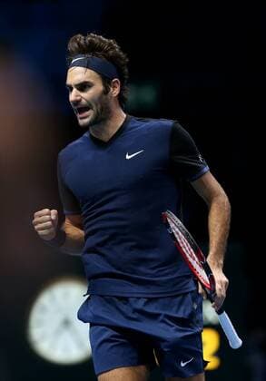 (151123) -- LONDON, Nov. 22, 2015 -- Roger Federer of Switzerland celebrates for a point during the men s singles final against Novak Djokovic of Serbia at the ATP Tennis Herren World Tour Finals at the O2 Arena in London, Britain, Nov. 22, 2015. Federer lost 0-2. )? (SP)BRITAIN-LONDON-TENNIS-ATP FINAL-FEDERER VS DJOKOVIC HanxYan 