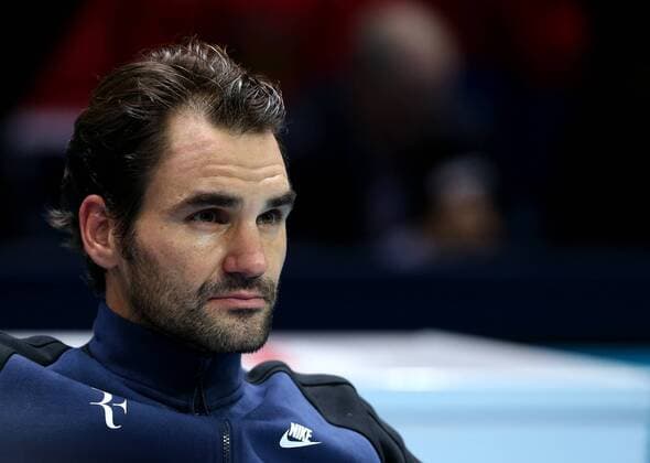 (151123) -- LONDON, Nov. 22, 2015 -- Roger Federer of Switzerland reacts after the men s singles final against Novak Djokovic of Serbia at the ATP Tennis Herren World Tour Finals at the O2 Arena in London, Britain, Nov. 22, 2015. Federer lost 0-2. )? (SP)BRITAIN-LONDON-TENNIS-ATP FINAL-FEDERER VS DJOKOVIC HanxYan 