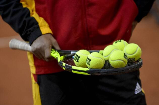 - GENT, BELGIUM: Illustrations shows tennis balls on a racket at a training practice ahead of the Davis Cup World Group final between Belgium and Great Britain, Wednesday 25 November 2015, at Flanders Expo in Gent. The final will be played from 27 to 29 November 2015 in Gent Flanders Expo. DIRKxWAEM  x04745718x