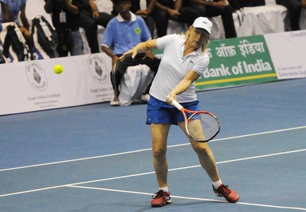 KOLKATA, INDIA - NOVEMBER 25: Czech tennis star Martina Navratilova with Indian tennis player Leander Paes in action match against Indian tennis players Sania Mirza and Mahesh Bhupathi at Kolkata Netaji Indor Stadium, on November 25, 2015 in Kolkata, India. During her visit, Navratilova will play three matches in Kolkata, Hyderabad and New Delhi, as part of International Premier Tennis League s promotional tour. (Photo by Subhankar Chakraborty Hindustan Times ) Czech Tennis Star Martina Navratilova In Kolkata