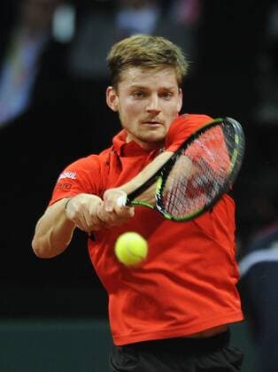 Tennis - 2015 Davis Cup by BNP Paribas - World Group Final: Belgium vs. Great Britain Day One Rubber One: Singles David Goffin (Bel) vs. Kyle Edmund (GB) Belgium s Goffin in action during the first set, at the Flanders Expo, Ghent. COLORSPORT JANE BARLOW 