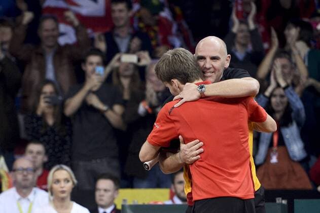 - GENT, BELGIUM: Belgian captain Johan Van Herck and Belgian David Goffin celebrate after winning the first game between Belgian David Goffin and Britain Kyle Edmund in the Davis Cup World Group final between Belgium and Great Britain, Friday 27 November 2015, at Flanders Expo in Gent. DIRKxWAEM  x04747459x