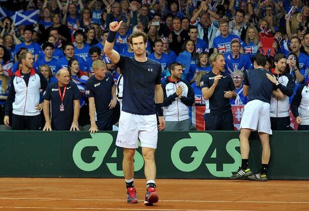 Tennis - 2015 Davis Cup by BNP Paribas - World Group Final: Belgium vs. Great Britain Day Two Rubber Three: Doubles Kimmer Coppejans (Bel) and Steve Darcis (Bel) vs. Andy Murray (GB) and Jamie Murray (GB) Great Britain s Andy Murray celebrates winning the match at the Flanders Expo, Ghent. COLORSPORT JANE BARLOW 