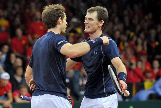 Tennis - 2015 Davis Cup by BNP Paribas - World Group Final: Belgium vs. Great Britain Day Two Rubber Three: Doubles Kimmer Coppejans (Bel) and Steve Darcis (Bel) vs. Andy Murray (GB) and Jamie Murray (GB) (left to right) Great Britain s Andy Murray celebrates winning the match with brother Jamie Murray at the Flanders Expo, Ghent. COLORSPORT JANE BARLOW 