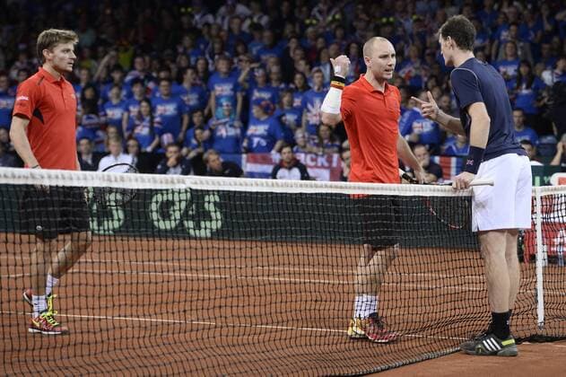 - GENT, BELGIUM: Belgian David Goffin, Belgian Steve Darcis and Britain s Jamie Murray argue during the third game in the Davis Cup tennis World Group final between Belgium and Great Britain, a doubles game of Belgians David Goffin and Steve Darcis versus Britain s Andy and Jamie Murray, Saturday 28 November 2015 at Flanders Expo in Gent. DIRKxWAEM  x04748105x