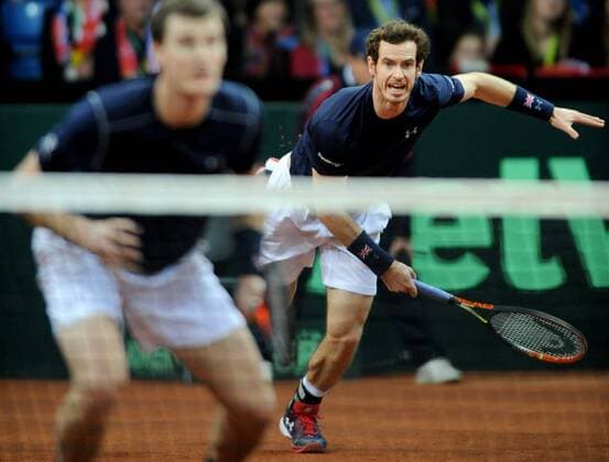 Tennis - 2015 Davis Cup by BNP Paribas - World Group Final: Belgium vs. Great Britain Day Two Rubber Three: Doubles David Goffin (Bel) and Steve Darcis (Bel) vs. Andy Murray (GB) and Jamie Murray (GB) Great Britain s (left to right) Jamie Murray and Andy Murray during the match at the Flanders Expo, Ghent. COLORSPORT JANE BARLOW 