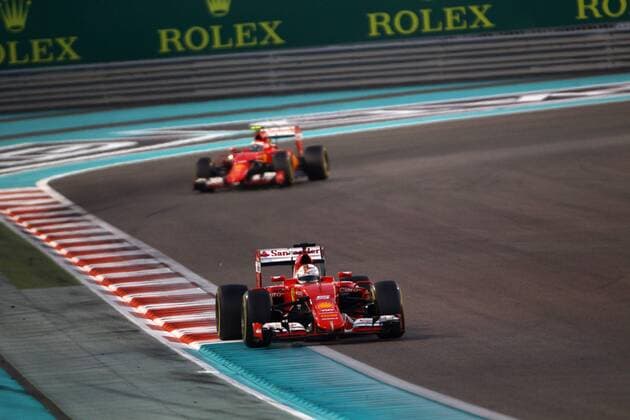 Abu Dhabi Grand Prix, UAE 26 - 29 November 2015 29.11.2015 - Race, Sebastian Vettel (GER) Scuderia Ferrari SF15-T leads Kimi Raikkonen (FIN) Scuderia Ferrari SF15-T 