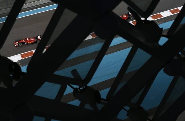 Motorsports: FIA Formula One World Championship WM Weltmeisterschaft 2015, Grand Prix of Abu Dhabi, 5 Sebastian Vettel (GER, Scuderia Ferrari), 7 Kimi Raikkonen (FIN, Scuderia Ferrari), xHOCHxZWEIx