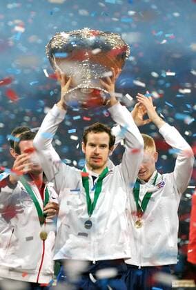 Tennis - 2015 Davis Cup by BNP Paribas - World Group Final: Belgium vs. Great Britain Day Three Rubber Four: Singles David Goffin (Bel) vs. Andy Murray (GB) Great Britain s Andy Murray celebrates winning his match with team-mates and winning the Davis Cup at the Flanders Expo, Ghent. COLORSPORT JANE BARLOW 