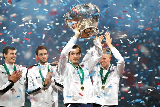Tennis - 2015 Davis Cup by BNP Paribas - World Group Final: Belgium vs. Great Britain Day Three Rubber Four: Singles David Goffin (Bel) vs. Andy Murray (GB) Great Britain s Andy Murray celebrates winning his match with team-mates and winning the Davis Cup at the Flanders Expo, Ghent. COLORSPORT JANE BARLOW 