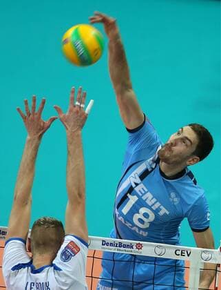 KAZAN, RUSSIA. DECEMBER 2, 2015. Halkbank s Kevin Le Roux (L) blocks Zenit s Maxim Mikhailov in their 2015 16 Season CEV Champions League Group D Round 3 volleyball match. VC Zenit Kazan won the game 3:0. Yegor Aleyev TASS  TS013018
