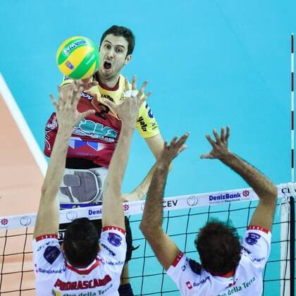 Men s Volleyball Champions League 3rd round group E match, Dukla Liberec against Cucine Lube Civitanova in Liberec, Czech Republic, December 3, 2015. Tomas Krisko of Liberec hits the ball to left Marko Podrascanin and right Alessandro Fei of Lube Civitanova. (CTKxPhoto RadekxPetrasek) CTKPhotoP201512030959301  PER 3