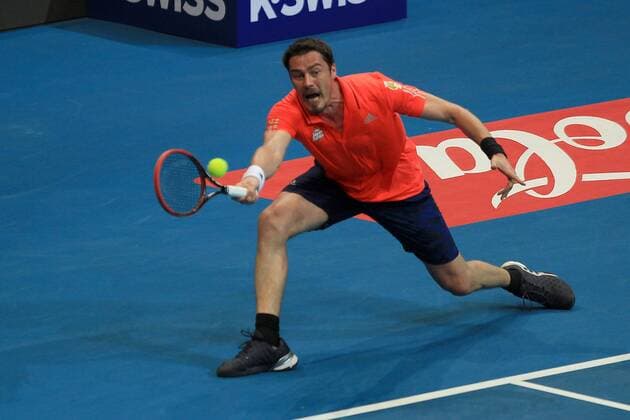 (151206) -- PASAY CITY, Dec. 6, 2015 -- Russian player Marat Safin of Japan Warriors returns the ball against Spanish player Carlos Moya of Singapore Slammers during their match in the International Premier Tennis League (IPTL) in Pasay City, the Philippines, Dec. 6, 2015. Marat Safin lost 4-6. ) (SP)PHILIPPINES-PASAY CITY-TENNIS-IPTL RouellexUmali 