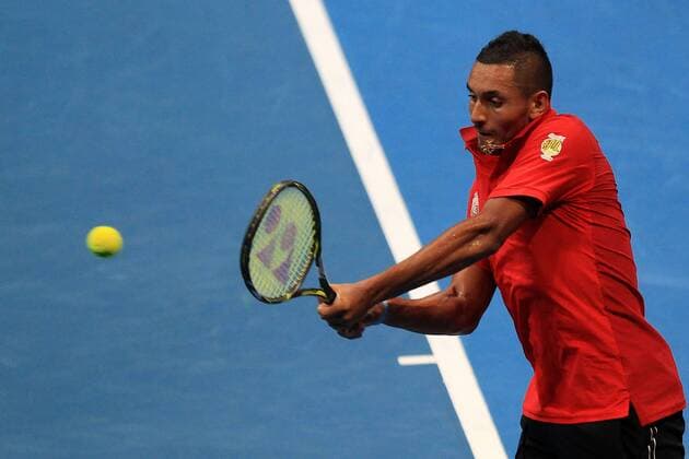 (151206) -- PASAY CITY, Dec. 6, 2015 -- Singapore Slammers player Nick Kyrgios of Australia returns the ball against Japan Warriors player Philipp Kohlschreiber of Germany during their match in the International Premier Tennis League (IPTL) in Pasay City, Philippines, Dec. 6, 2015. Kyrgios won 6-5. ) (SP)PHILIPPINES-PASAY CITY-TENNIS-IPTL RouellexUmali 