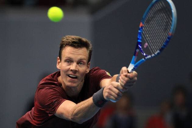 (151207) -- PASAY CITY, Dec. 7, 2015 -- Obi UAE Royals player Thomas Berdych of Czech Republic returns the ball against Micromax Indian Aces players during their men s doubles match in the International Premier Tennis League (IPTL) in Pasay City, the Philippines, Dec. 7, 2015. ) (SP)PHILIPPINES-PASAY CITY-TENNIS-IPTL ROUELLExUMALI 