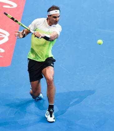 Dec. 7, 2015 - Manila, Philippines - MANILA, Philippines - 14-time Grand Slam singles winner Rafael Nadal in action during the menÃ¢â‚¬â ¢s singles match for the International Premiere Tennis League (IPTL) held at the Mall of Asia Arena in Pasay City, south of Manila on 07 December 2015. The Spanish player is in the country along with other international tennis superstars for the star-studded premiere league. International Premiere Tennis League in Manila  - ZUMAn230