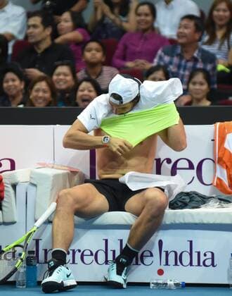 Dec. 8, 2015 - Pasay City, Manila, Philippines - MANILA, Philippines - Fans react as spanish tennis superstar Rafael Nadal removes his shirt during the International Premiere Tennis League (IPTL) at the Mall of Asia Arena in Pasay City, south of Manila, Philippines on December 08, 2015. International Premiere Tennis League in Manila  - ZUMAn230