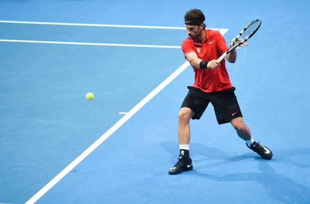 Dec. 8, 2015 - Pasay City, Philippines - MANILA, Philippines - Former world no. 1 tennis player Carlos Moya in action during the men s match of the International Premiere Tennis League (IPTL) at the Mall of Asia Arena in Pasay City, south of Manila, Philippines on December 08, 2015. The Spanish player is in the country along with other international tennis superstars for the star-studded league. International Premiere Tennis League in Manila  - ZUMAn230