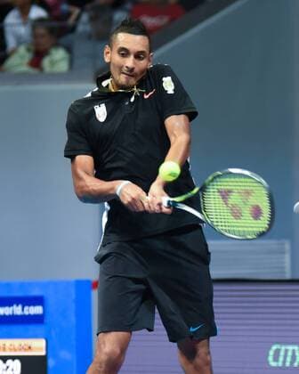 Dec. 8, 2015 - Pasay City, Philippines - MANILA, Philippines - Nick Krygios of the Singapore Slammers returns the ball to his opponent Tomas Berdych of the UAE Royals during the menÃ¢â‚¬â ¢s singles match for the International Premiere Tennis League (IPTL) at the Mall of Asia Arena in Pasay City, south of Manila, Philippines on December 08, 2015. Berdych Vs Krygios  - ZUMAn230