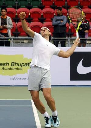 NEW DELHI, INDIA - DECEMBER 10: Rafael Nadal, Spanish Tennis player during the inaugural match for a tie-up between Rafael Nadal Academy and Mahesh Bhupathi Tennis Academies (MBTA) to identify talents in India and offer them the opportunity to receive expert coaching, at R.K. Khanna Tennis Complex , RK Puram, on December 10, 2015 in New Delhi, India. (Photo by Sanchit Khanna Hindustan Times ) Rafael Nadal And Mahesh Bhupathi Tennis Academies Tie Up For Collaboration
