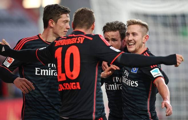 12.12.2015, Fussball 1.Bundesliga 2015 2016, 16.Spieltag, VfL Wolfsburg - Hamburger SV, in der Volkswagen Arena, Wolfsburg. Jubel v.l. Michael Gregoritsch (Hamburg) , Pierre-Michel Lasogga (Hamburg) , Torschütze Nicolai Müller (Hamburg) und Lewis Holtby (Hamburg) zum Tor zum 0:1 