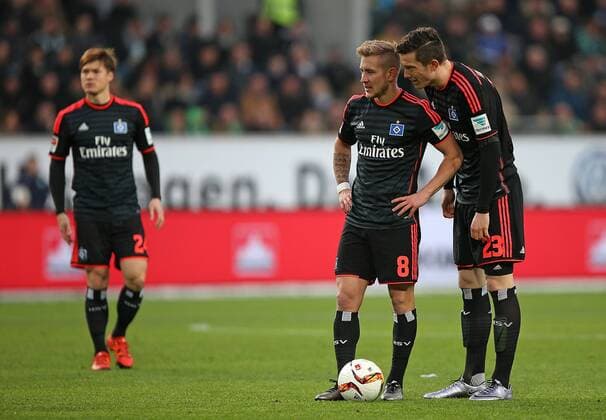 12.12.2015, Fussball 1.Bundesliga 2015 2016, 16.Spieltag, VfL Wolfsburg - Hamburger SV, in der Volkswagen Arena, Wolfsburg. v.l. Gotoku Sakai (Hamburg) , Lewis Holtby (Hamburg) und Michael Gregoritsch (Hamburg) 