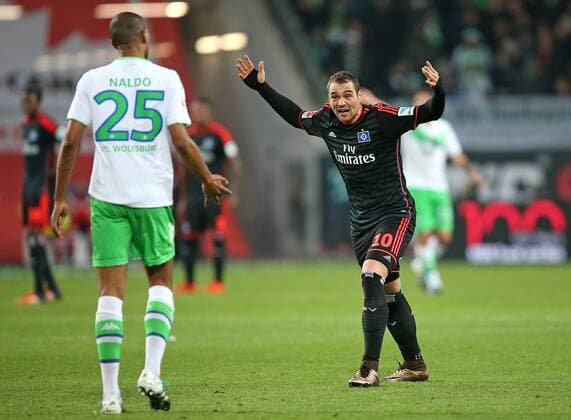 12.12.2015, Fussball 1.Bundesliga 2015 2016, 16.Spieltag, VfL Wolfsburg - Hamburger SV, in der Volkswagen Arena, Wolfsburg. v.l. Naldo (Wolfsburg) und Pierre-Michel Lasogga (Hamburg) geraden aneinander 