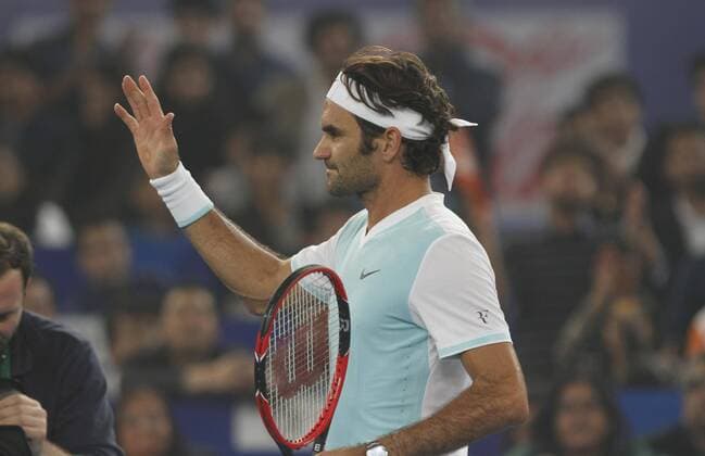 NEW DELHI, INDIA - DECEMBER 12: Roger Federer of Obi UAE Royals in action against Rafael Nadal of Micromax Indian Aces Mens during the Coca-Cola International premier Tennis League at IG Stadium on December 12, 2015 in New Delhi, India. (Photo by Virendra Singh Gosain Hindustan Times ) Coca-Cola International Premier Tennis League